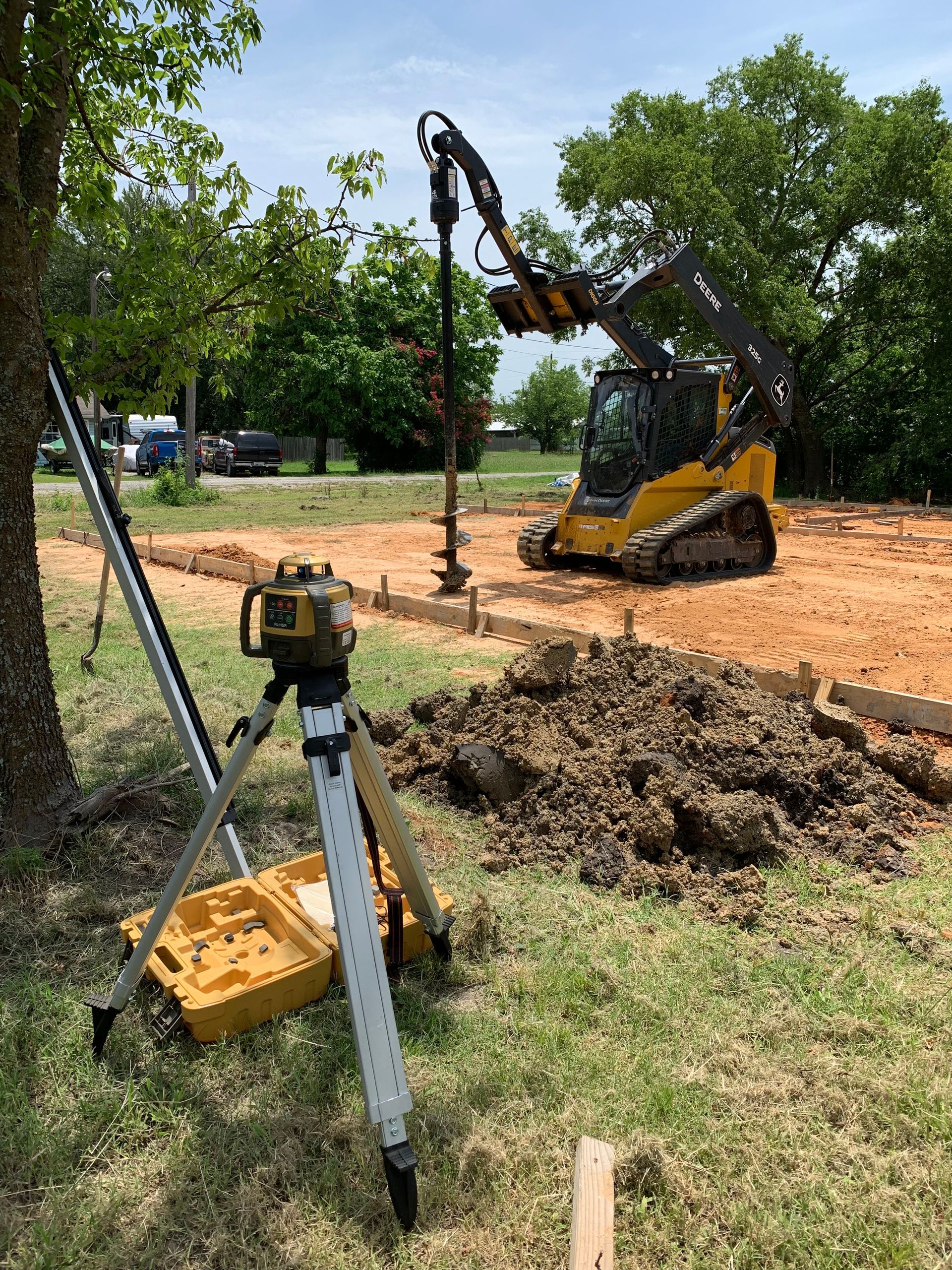 Skid steer, new house build, piers