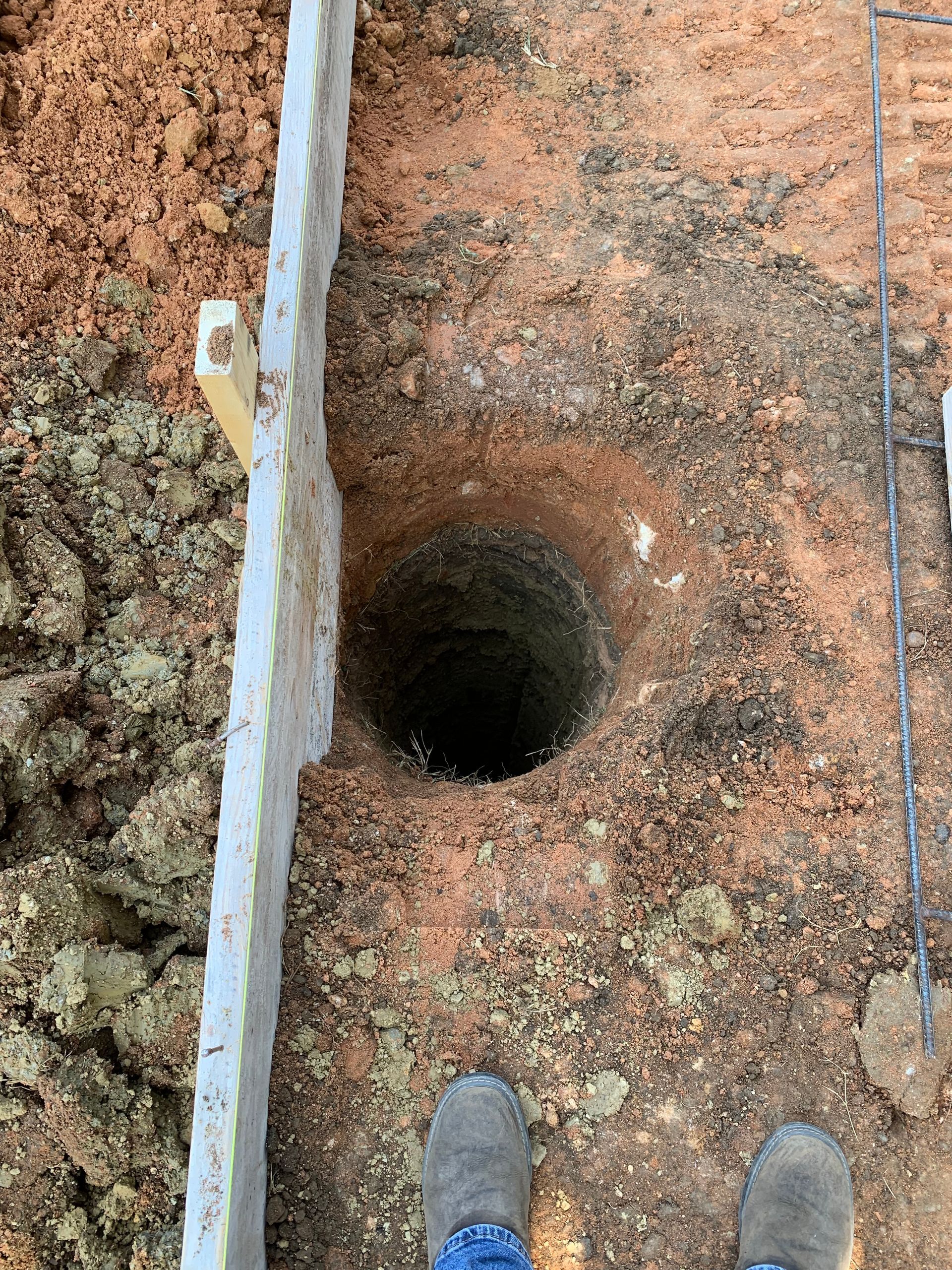 house piers made with skid steer