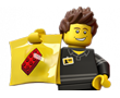 Un omino Lego tiene in mano un sacchetto di mattoncini Lego.