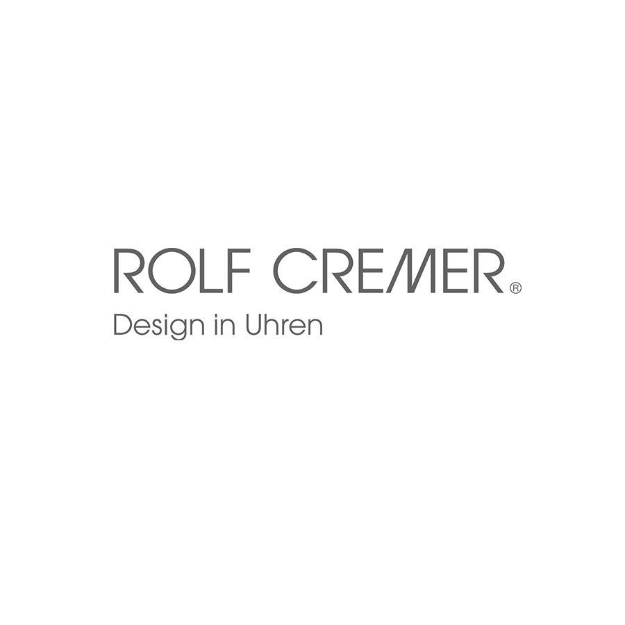 Ein Logo für Rolf Cremer Design in Uhren auf weißem Hintergrund.