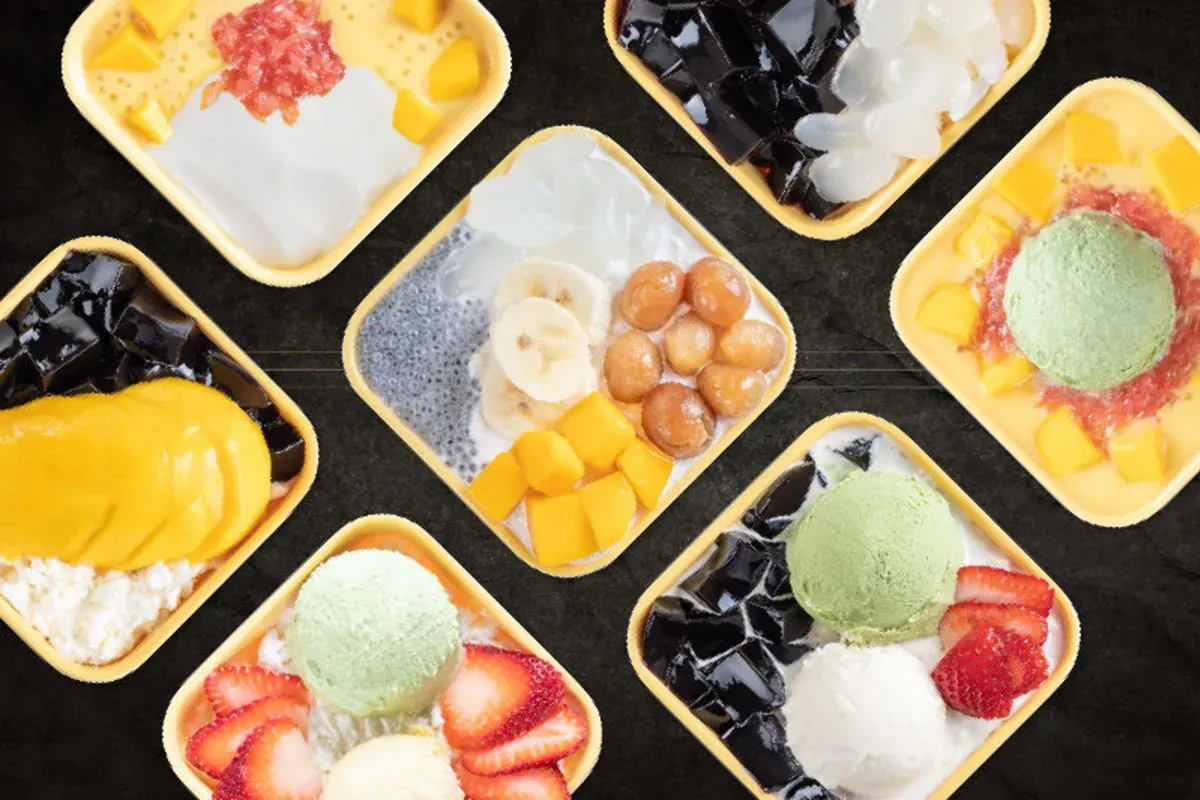 Front restaurant client success story Sweethoney Dessert franchise, 7 different Hong Kong desserts in yellow square bowls.