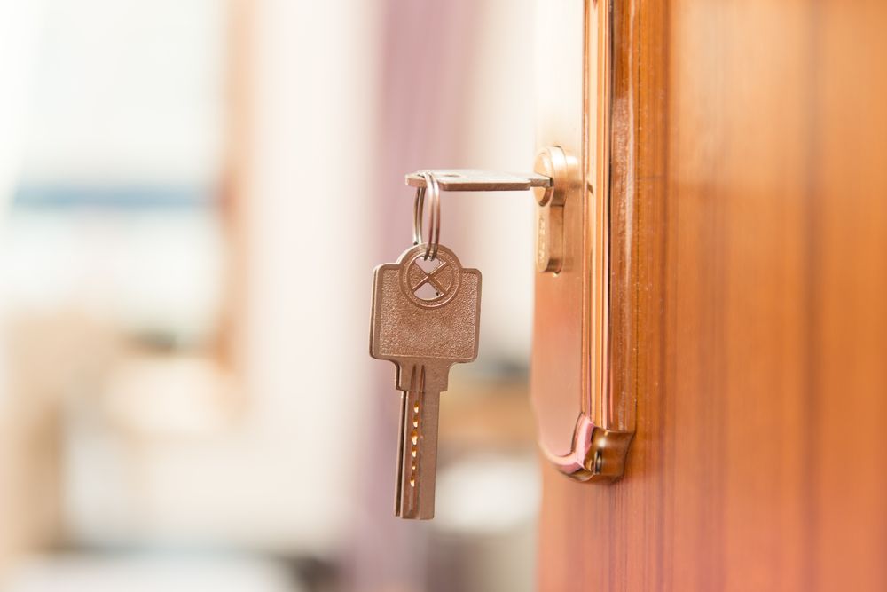 Key in a Door Lock, Ready to Open — Cairns Locksmiths in Woree, QLD