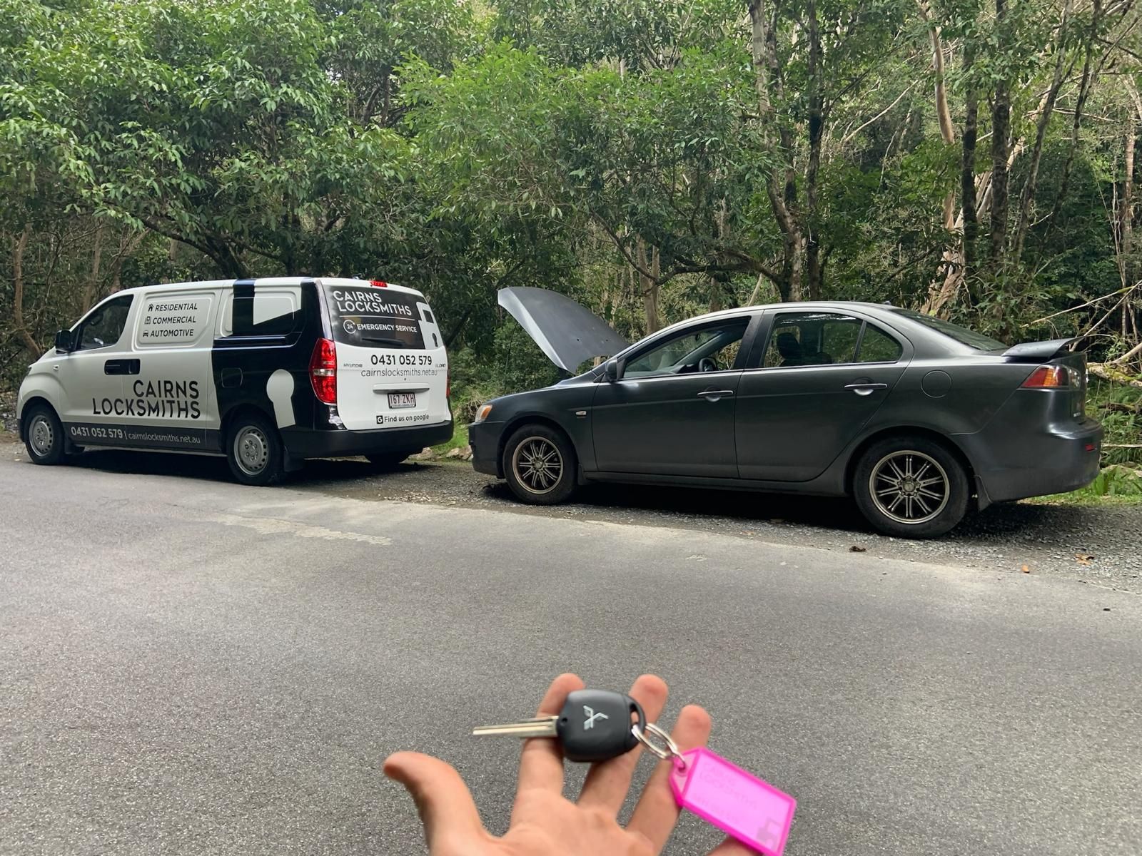 A Person Installing a Doorknob — Cairns Locksmiths in Woree, QLD
