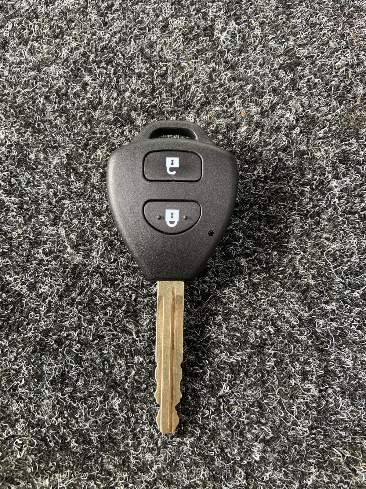 Black car key with two buttons — Cairns Locksmiths in Edmonton, QLD