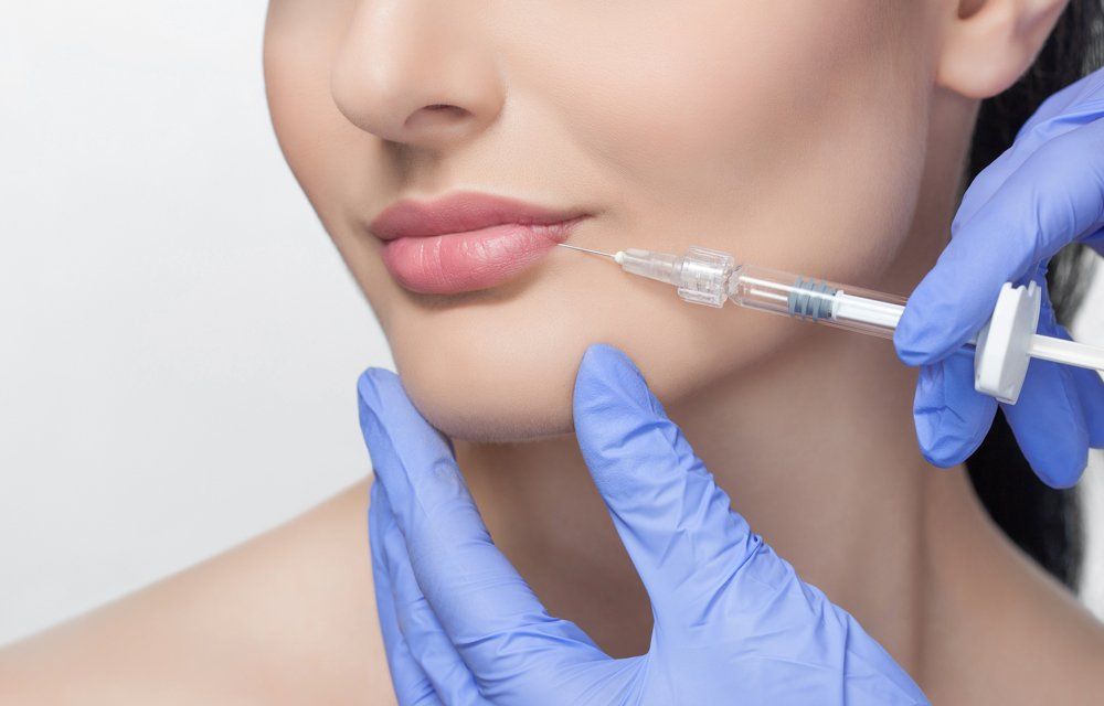 Injecting On Woman's Lip — Jacksonville, FL — Ageless Rejuvenation Center