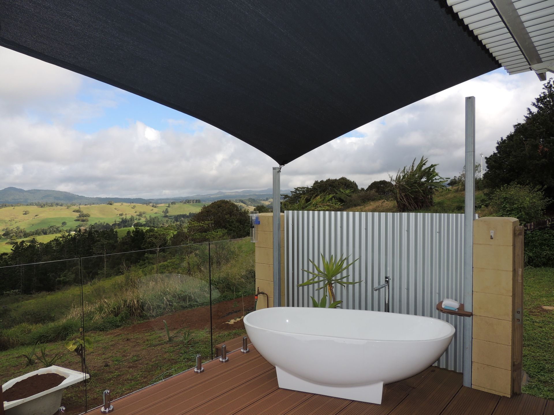 A Bathtub On A Deck With A View Of The Countryside — Style Shades Installation In Edmonton, QLD