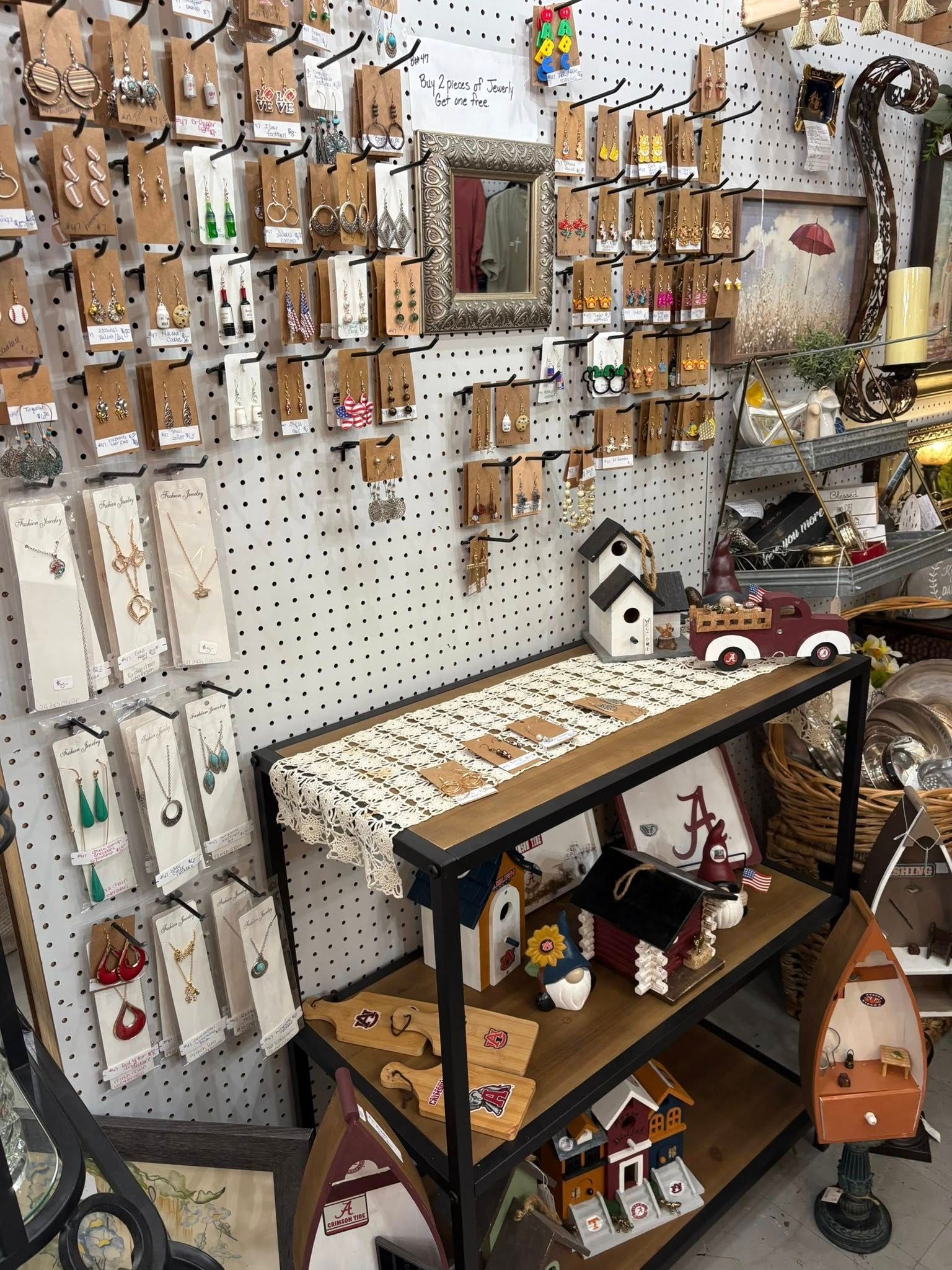 A welcoming view of SunShine Attic Boutique with warm neutral styling, curated displays, and a cozy shopping atmosphere.