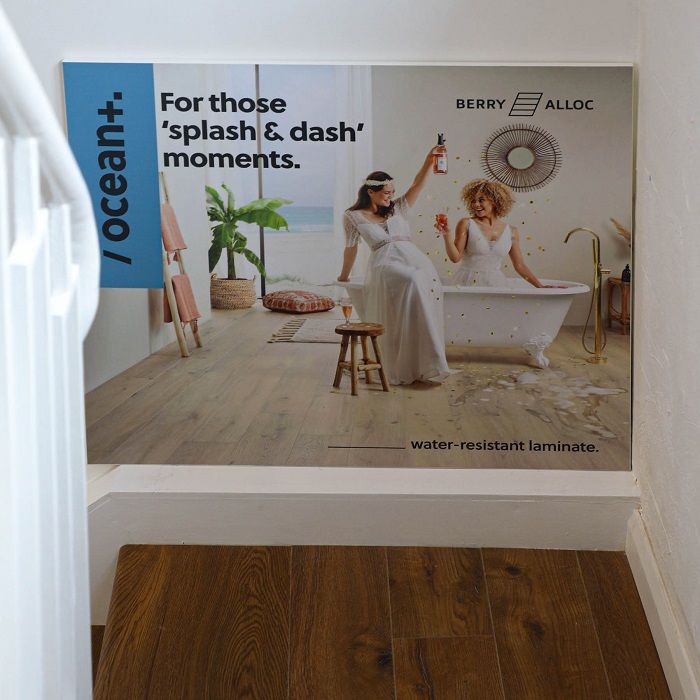 A picture of two women in a bathtub with the words for those splash and dash moments Custom Signs & Signage by Fulham Signs 