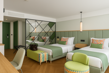 A hotel room with two beds , a chair , a desk and a mirror.