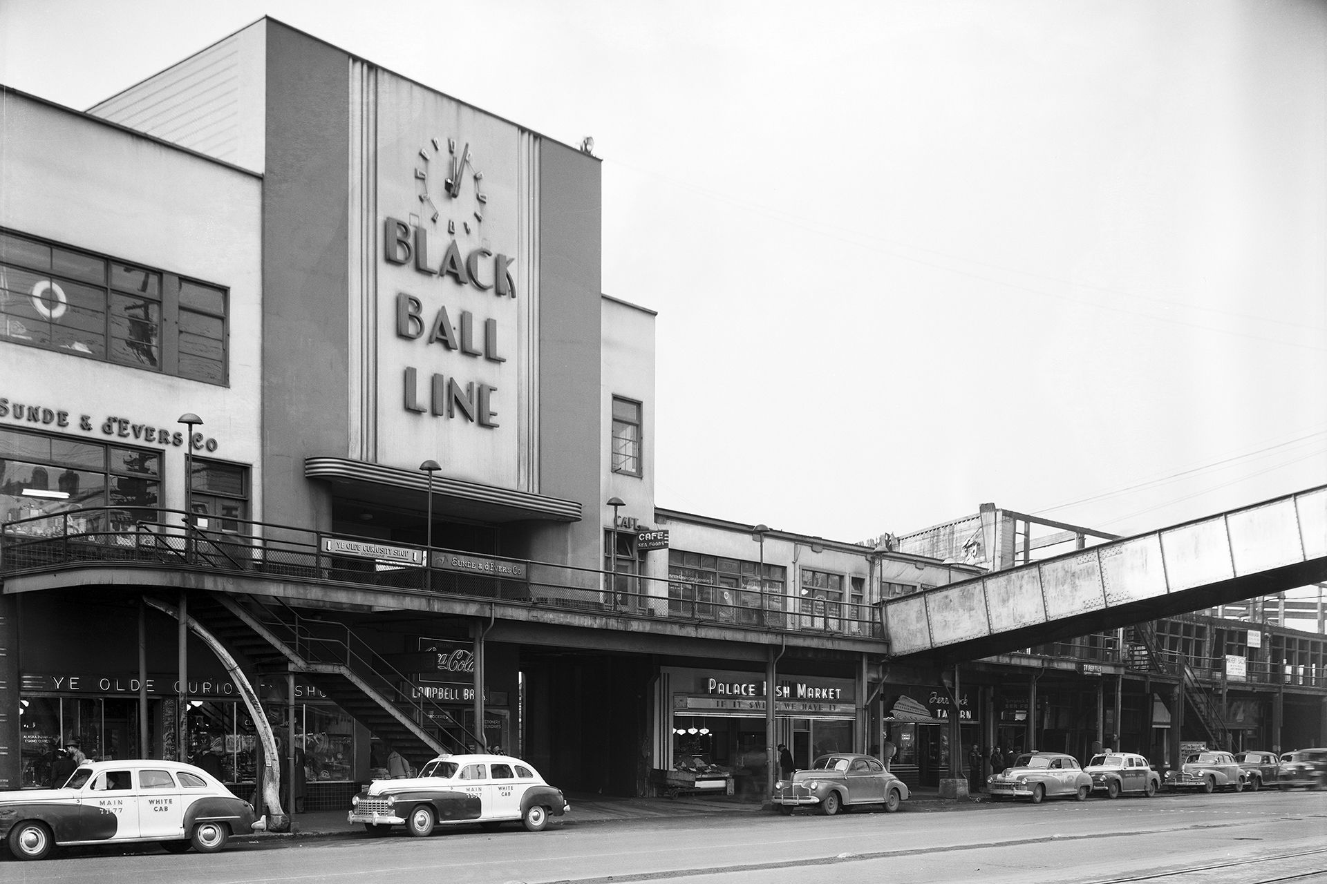 A black and white photo of the Black Ball Ferry Line terminal