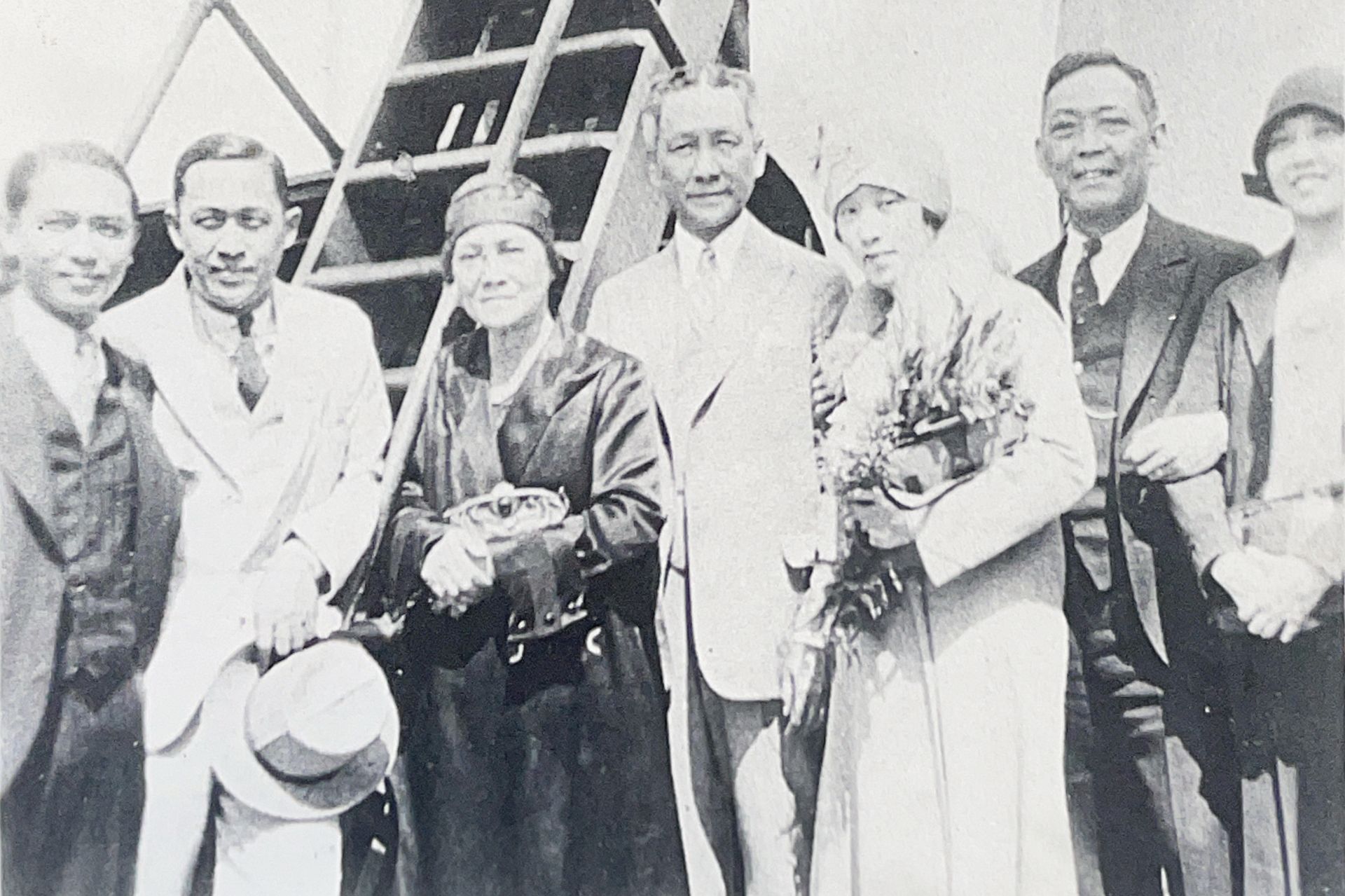 A black and white photo of a group of people