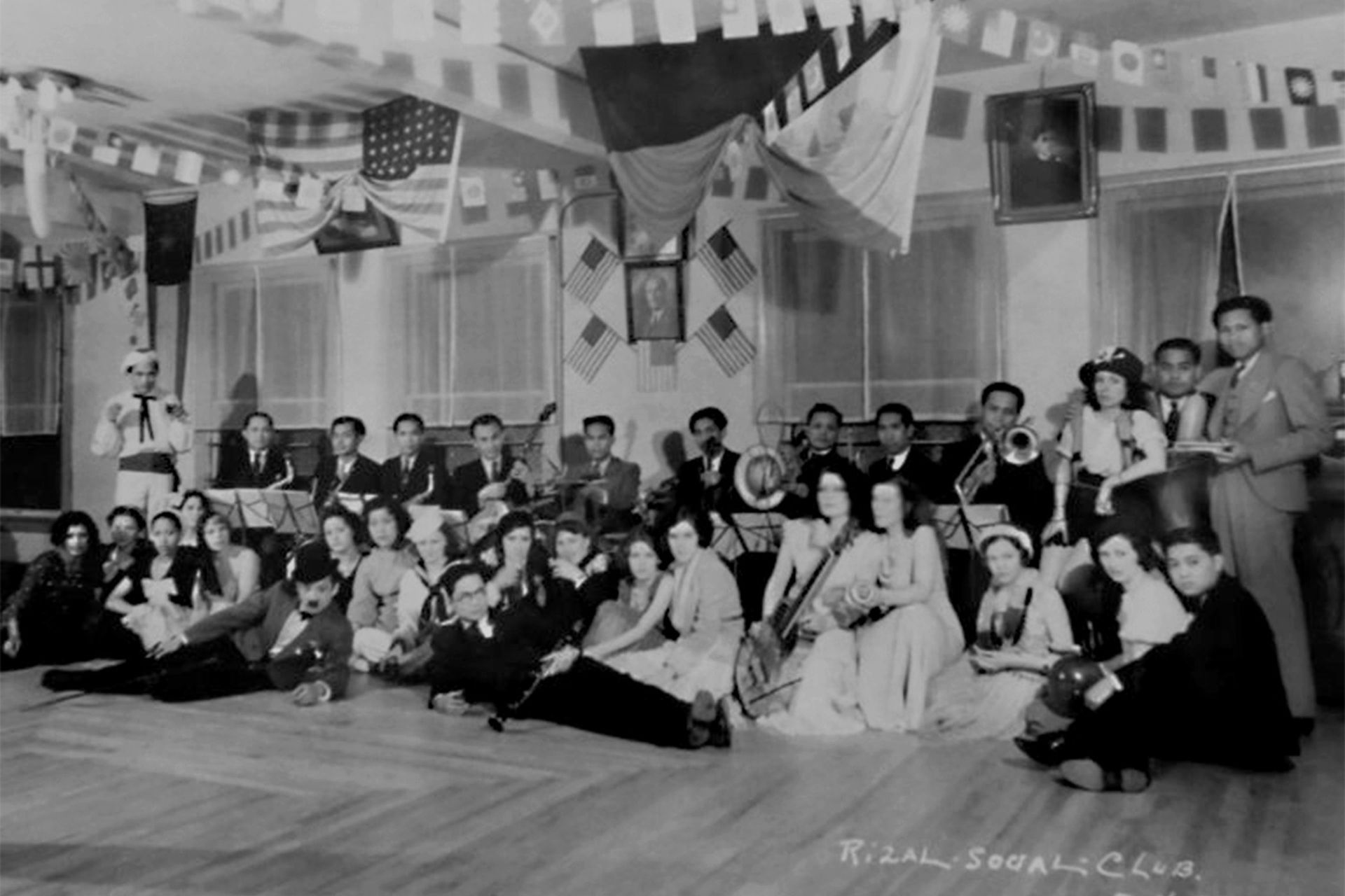 A black and white photo of a group of people