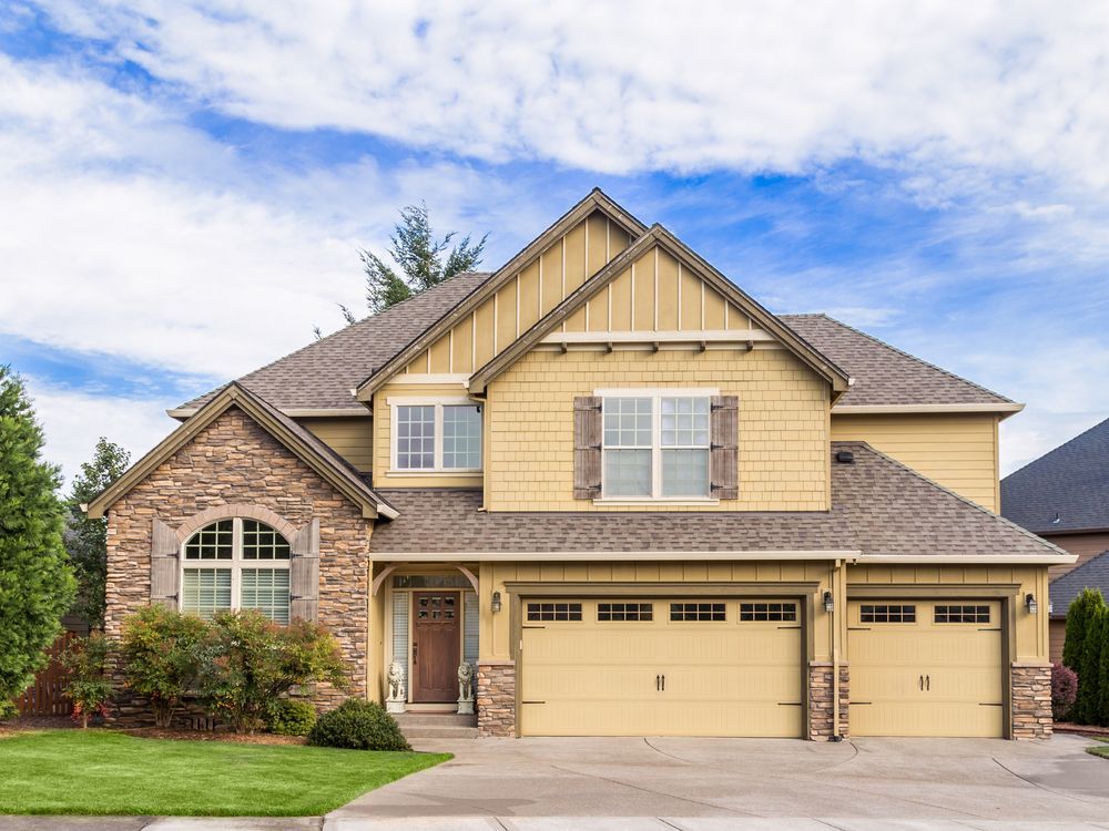 Two-Story House With Tan Siding — Peterson Property Valuations Brisbane in Brisbane West, QLD