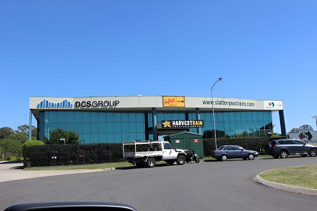 Office Building With Blue Tinted Windows — Peterson Property Valuations Brisbane in Caloundra West, QLD