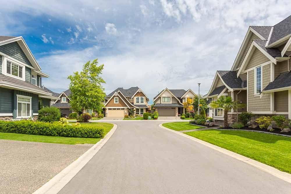 Suburban Street Lined With Houses — Peterson Property Valuations Brisbane in Caloundra West, QLD