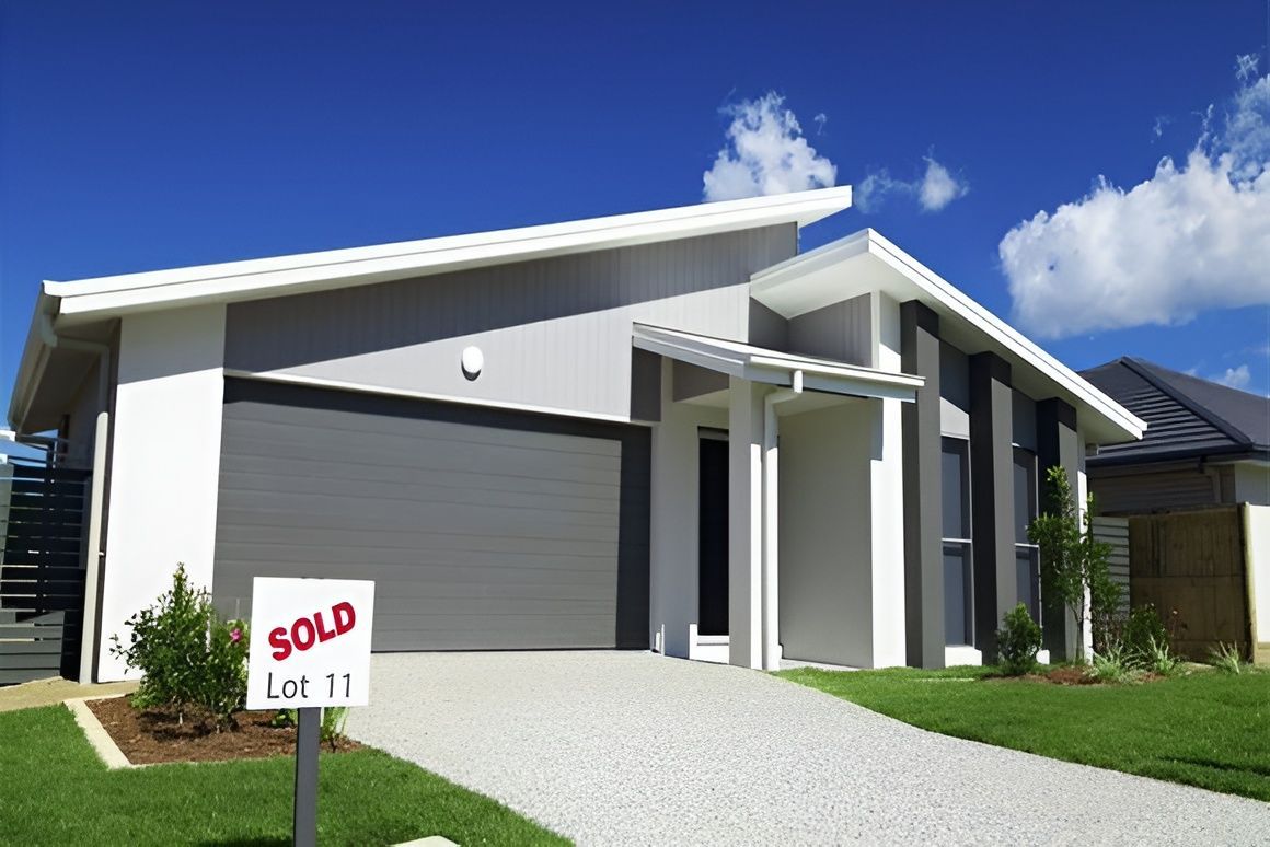 Modern House With Grey — Peterson Property Valuations Brisbane in Southern M1 Gold Coast, QLD