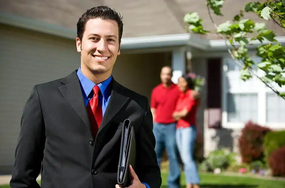 Real Estate Agent Smiling — Peterson Property Valuations Brisbane in Caboolture, QLD