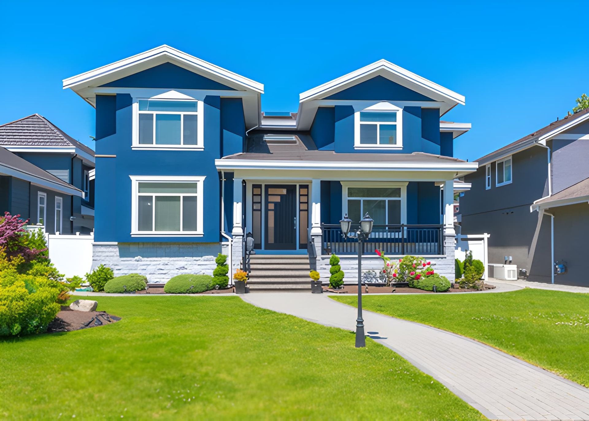 Blue Two-story House With White Trim — Peterson Property Valuations Brisbane in Gold Coast, QLD
