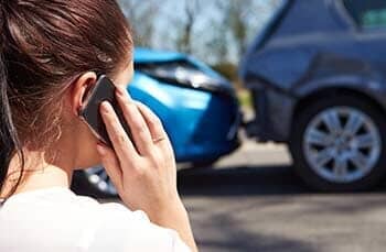 Female Driver Making Phone Call After Traffic Accident — Insurance Agency in Colonial Heights, VA
