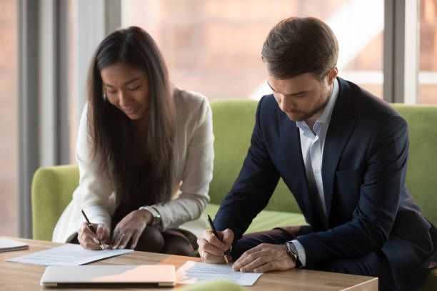 business man checking the terms for level 1 accredited service provider