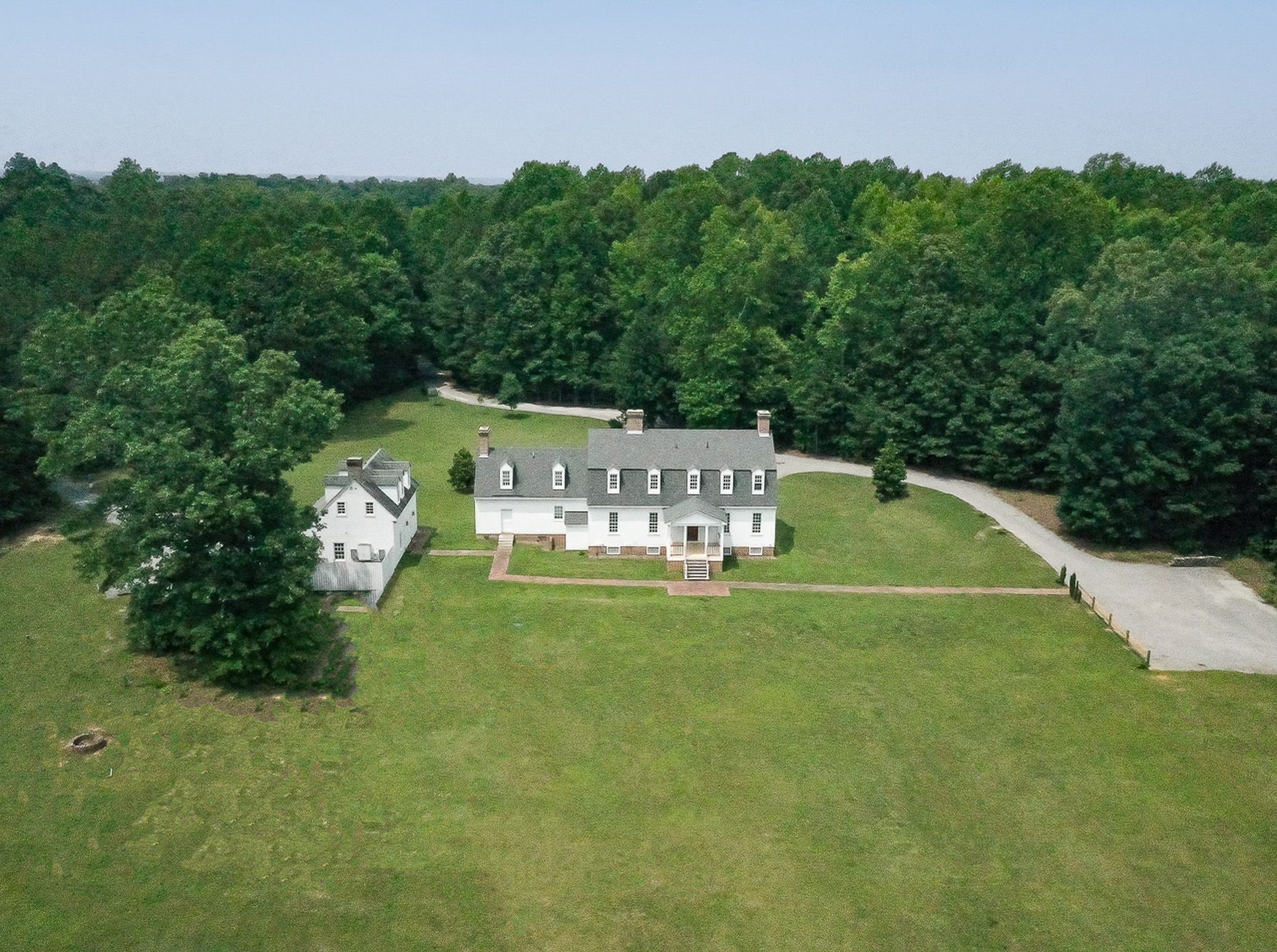 This is an aerial photo of the Bed and Breakfast from the back side of the main house.