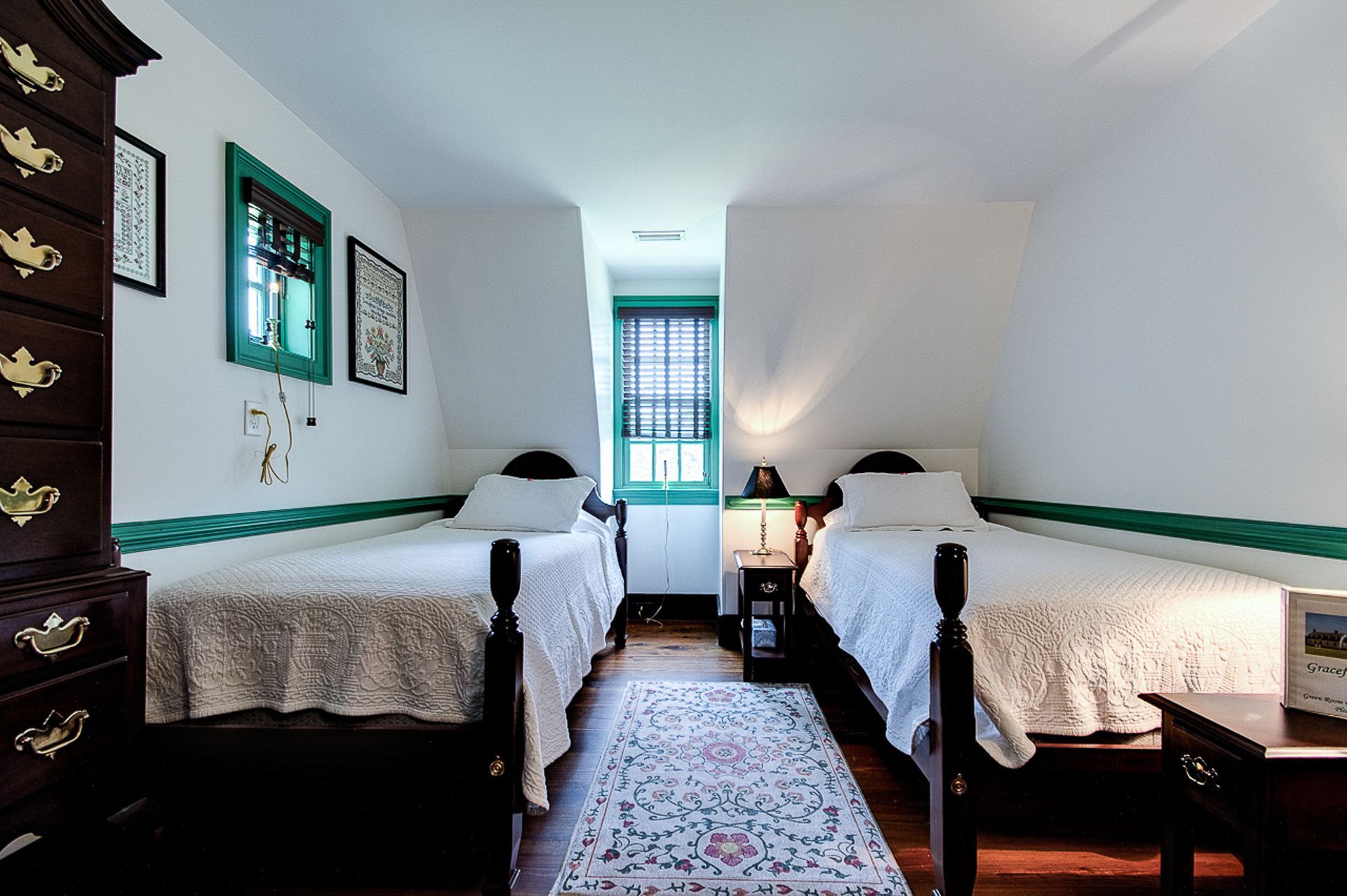 This is a photo of the twin extra long beds inside of the Green Room at the Gracefield Hall BNB.