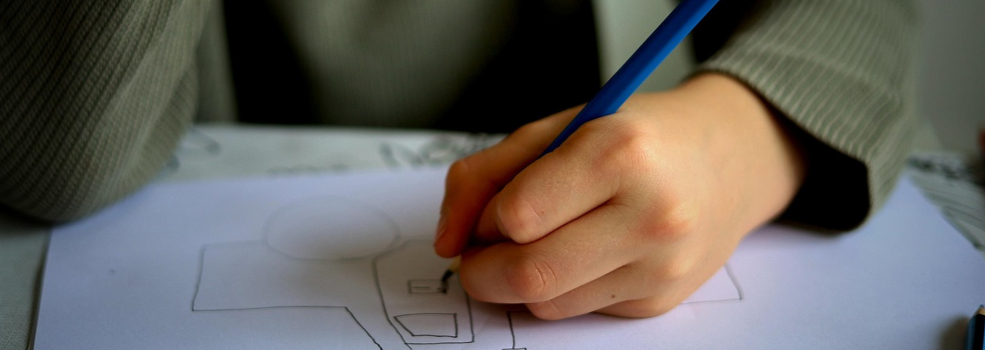 Picture of a child drawing. Picture of a child drawing.