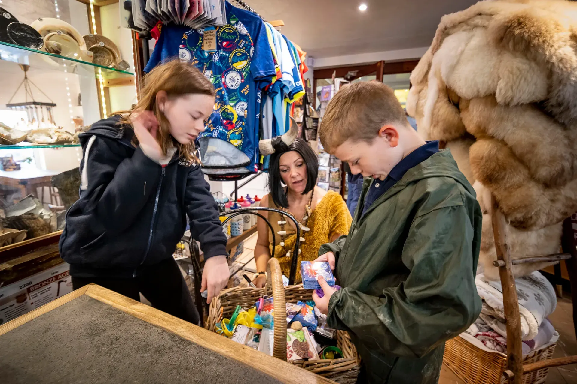 A group of children are shopping in a store.