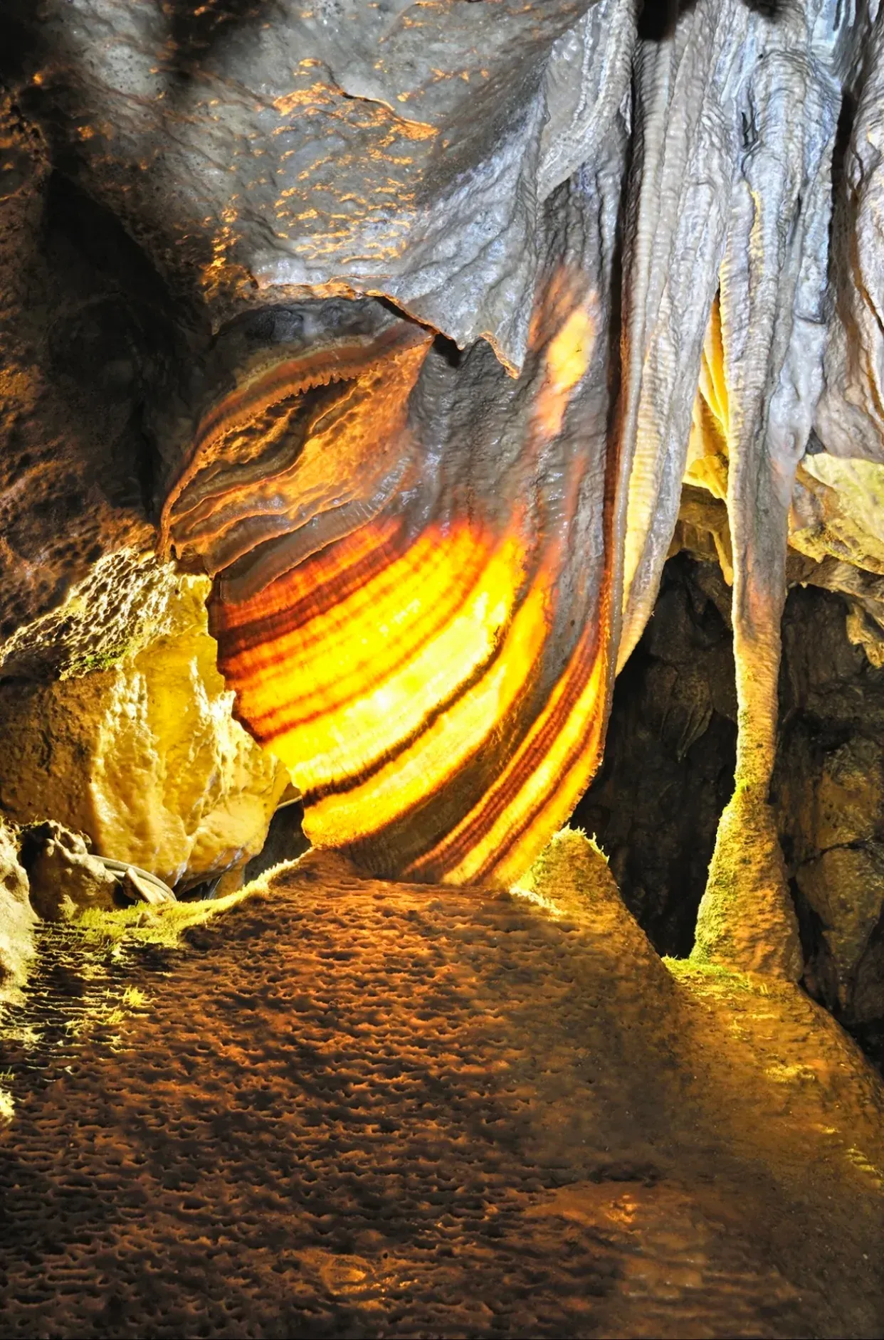 A cave with a swirl in the middle of it