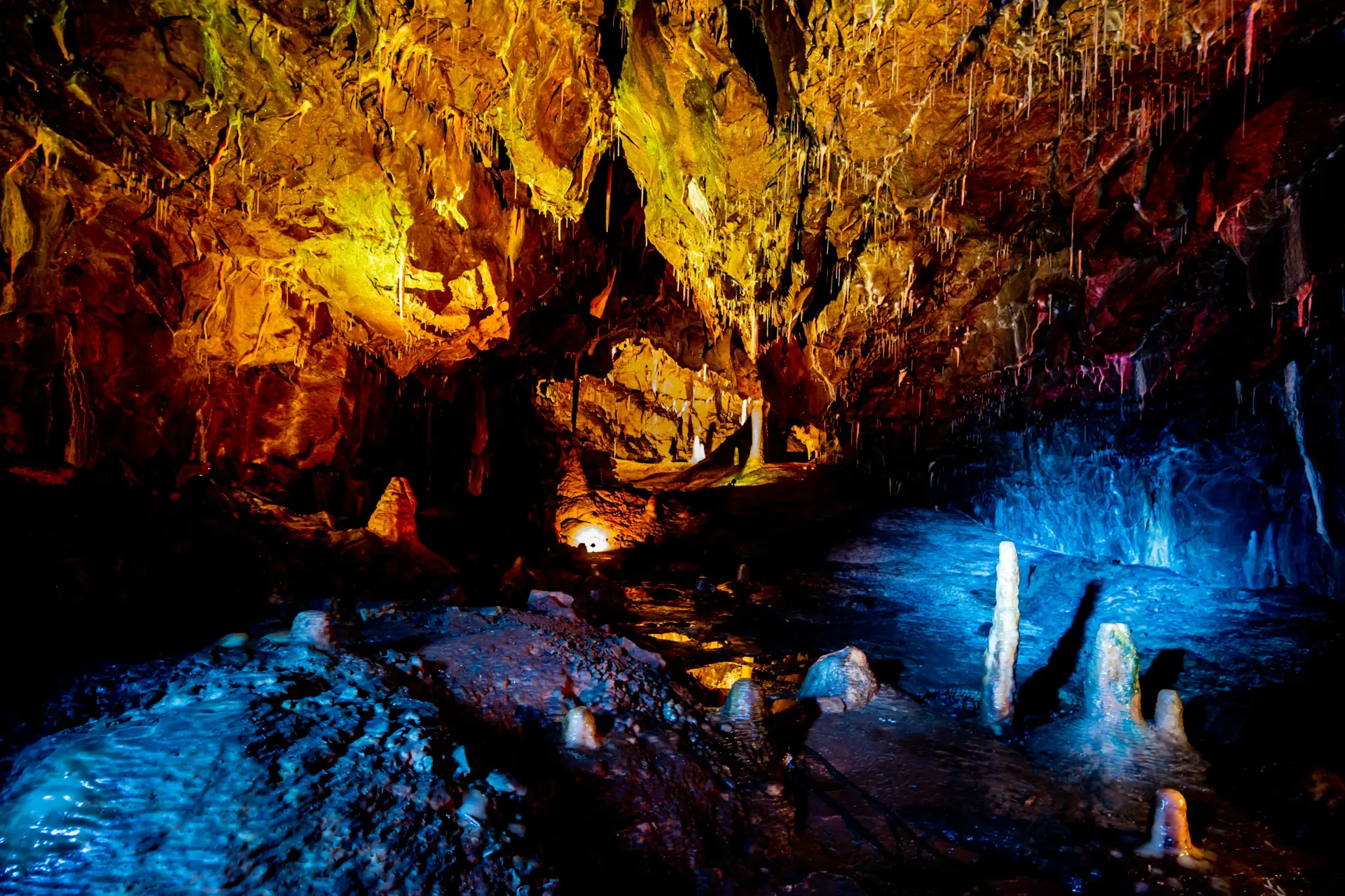 A cave with a lot of lights on it