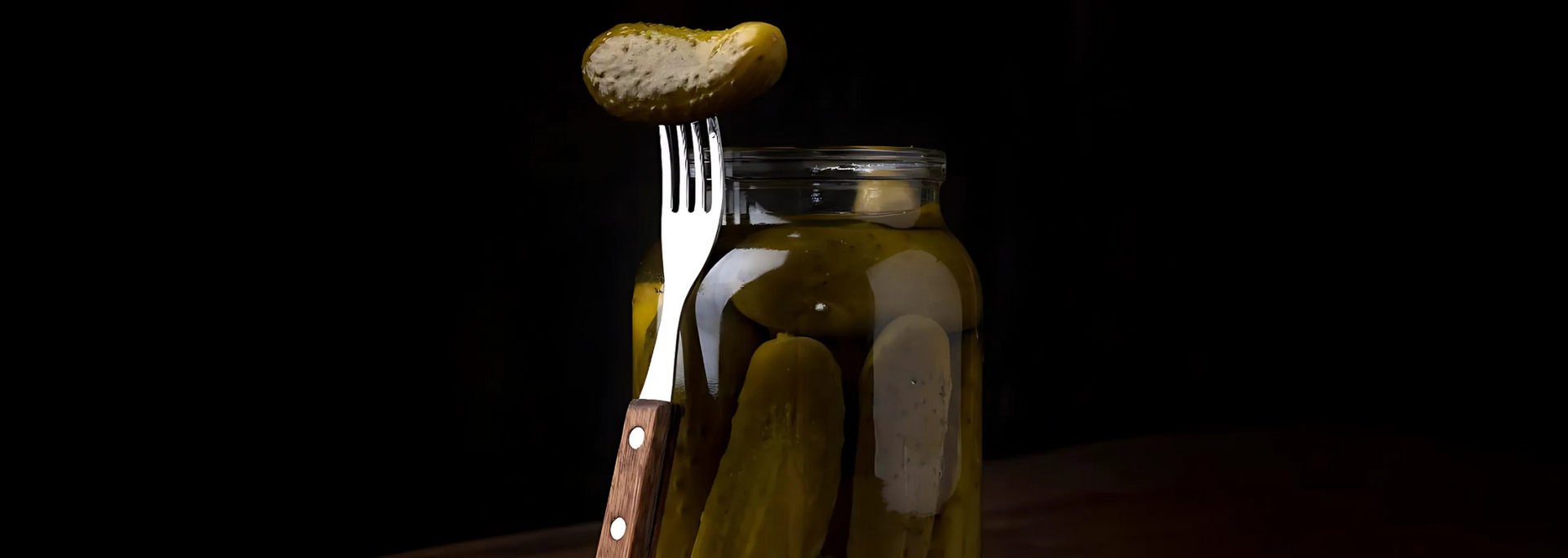 Picture of an opened pickle jar.
