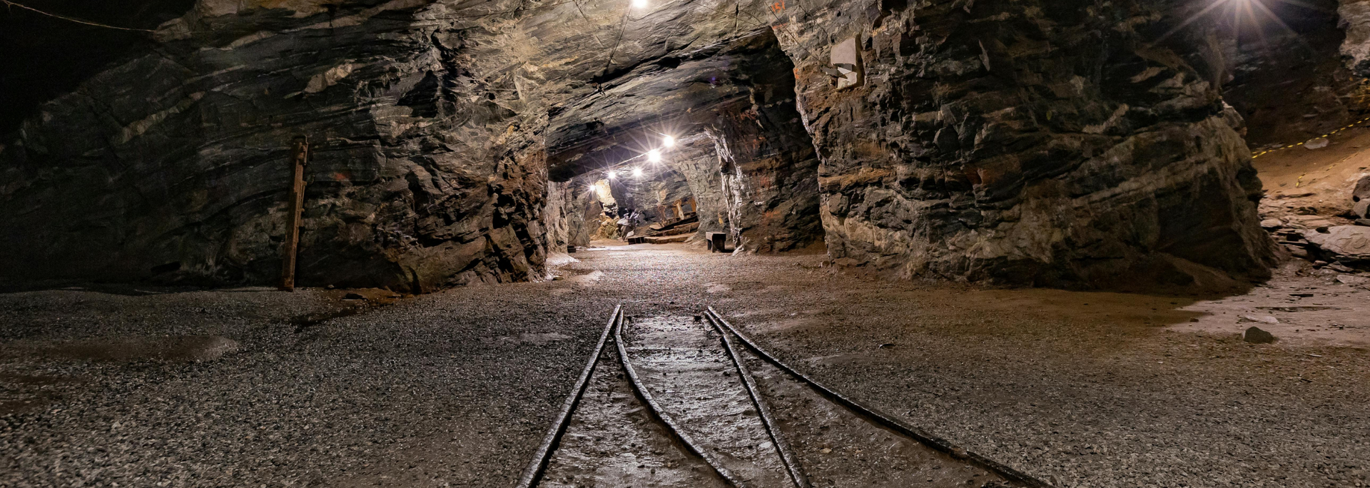 Picture of an old rail track in a mine.