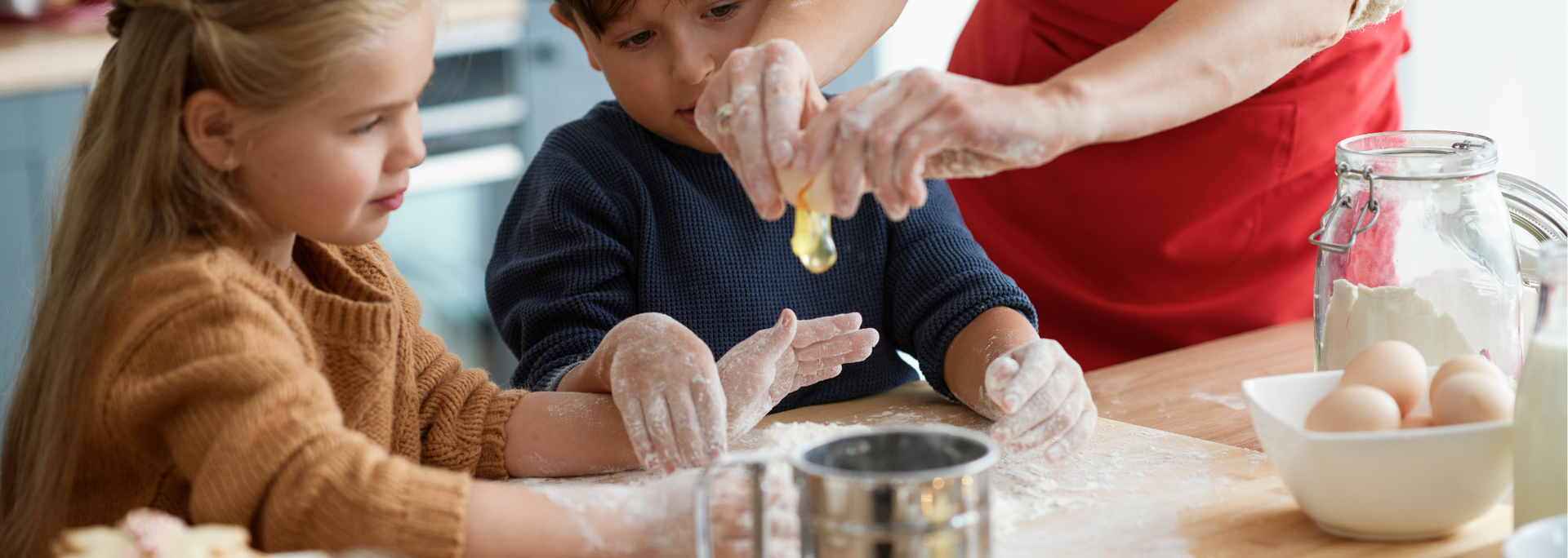 Picture of kids doing a bit of baking.
