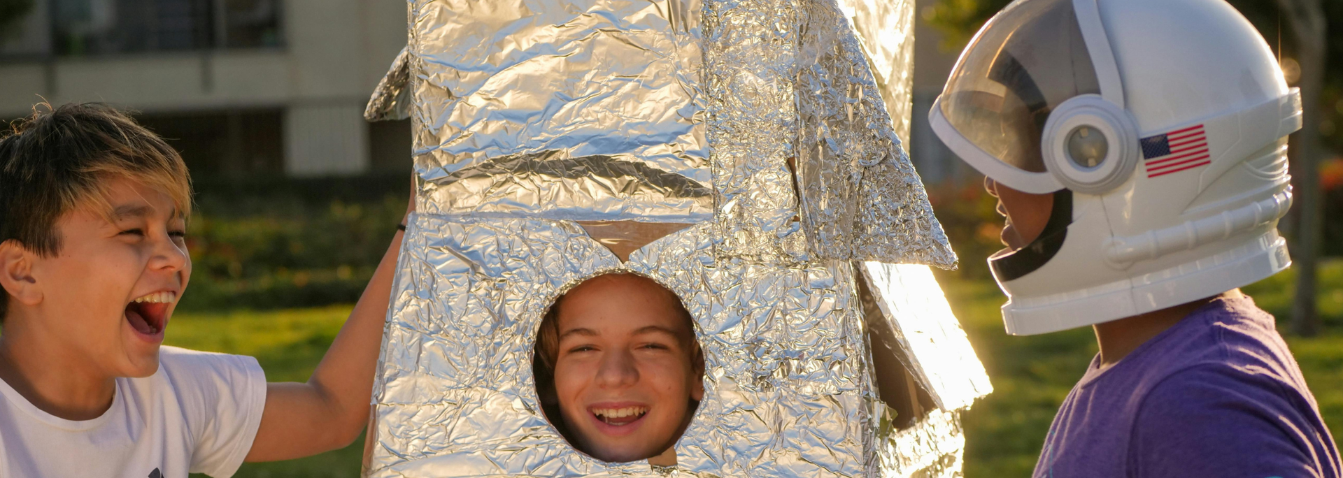 Picture of kids at a party dressed up in space themed costumes. 