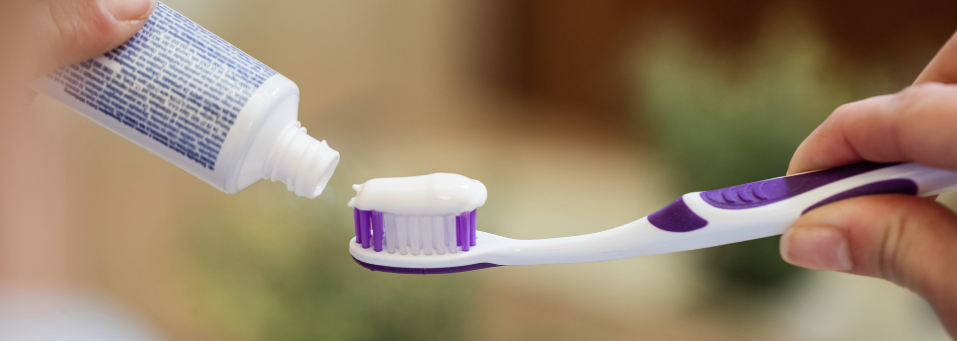 Picture of toothpaste on a toothbrush. 