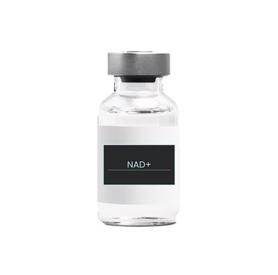 A bottle of nad + with a black label on a white background.