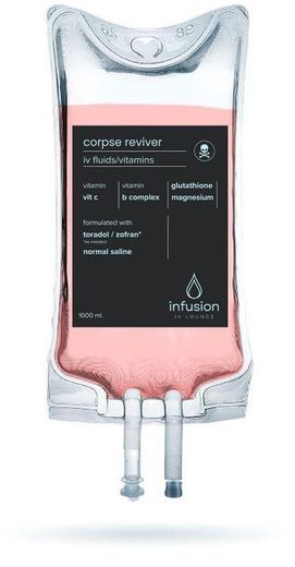 A bag of infusion with a pink liquid in it.