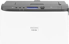 A white ricoh printer is sitting on a white surface.