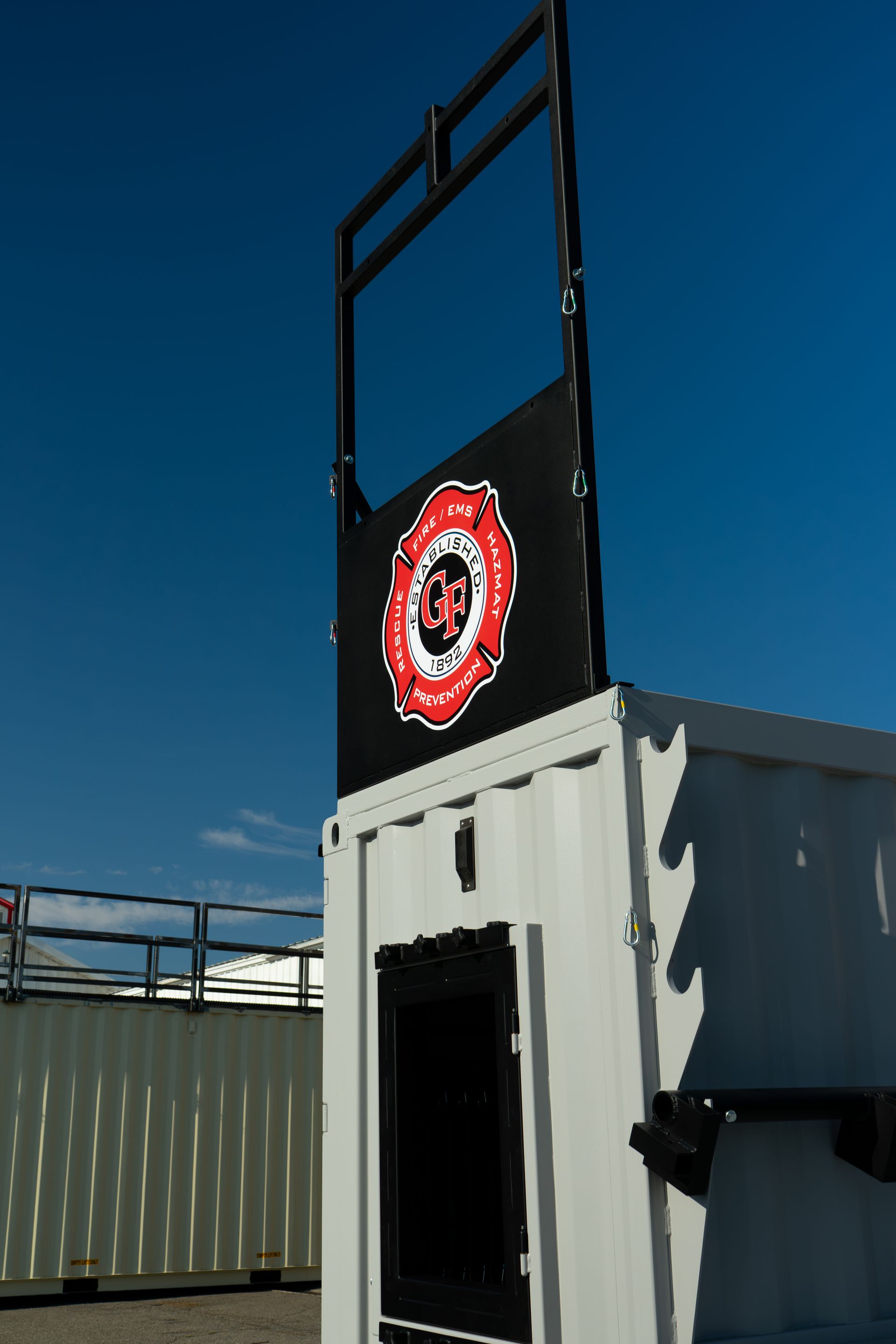 Firefighter training prop with Great Falls Fire Rescue Badge on it