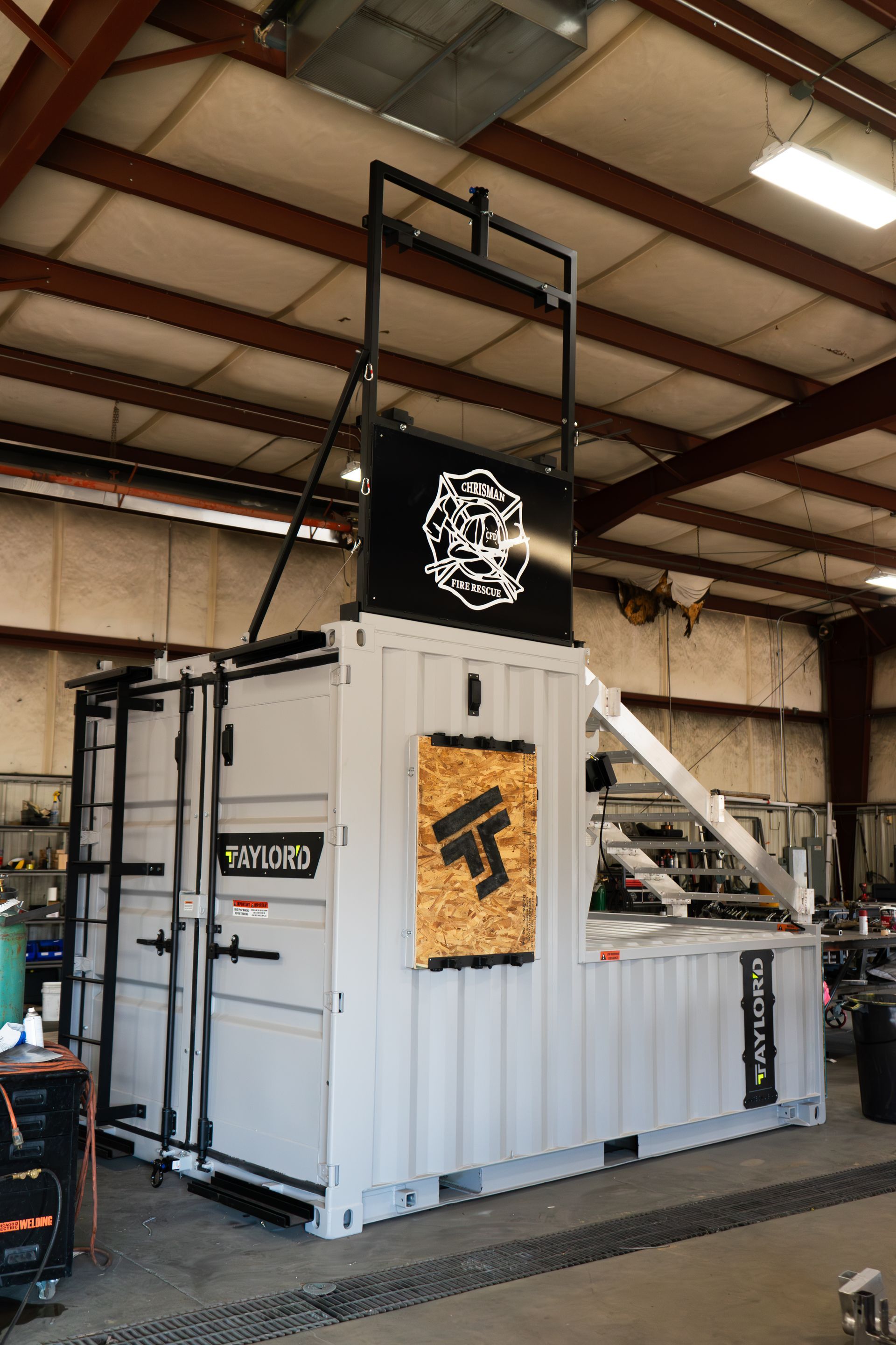 Firefighter training prop with Chrisman Fire Rescue Badge