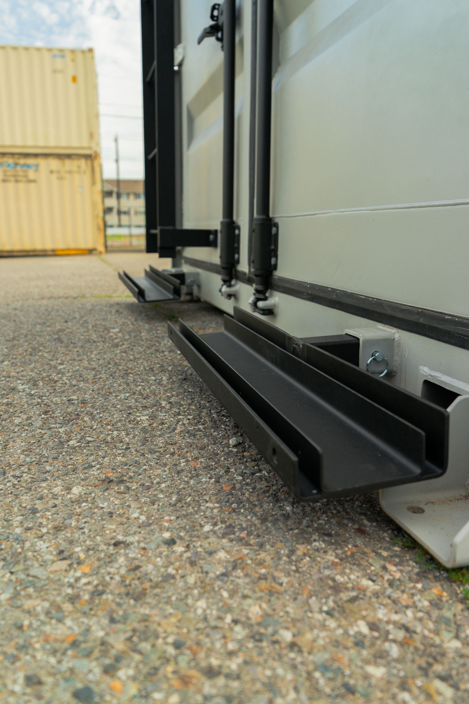 rails on the end of a shipping container