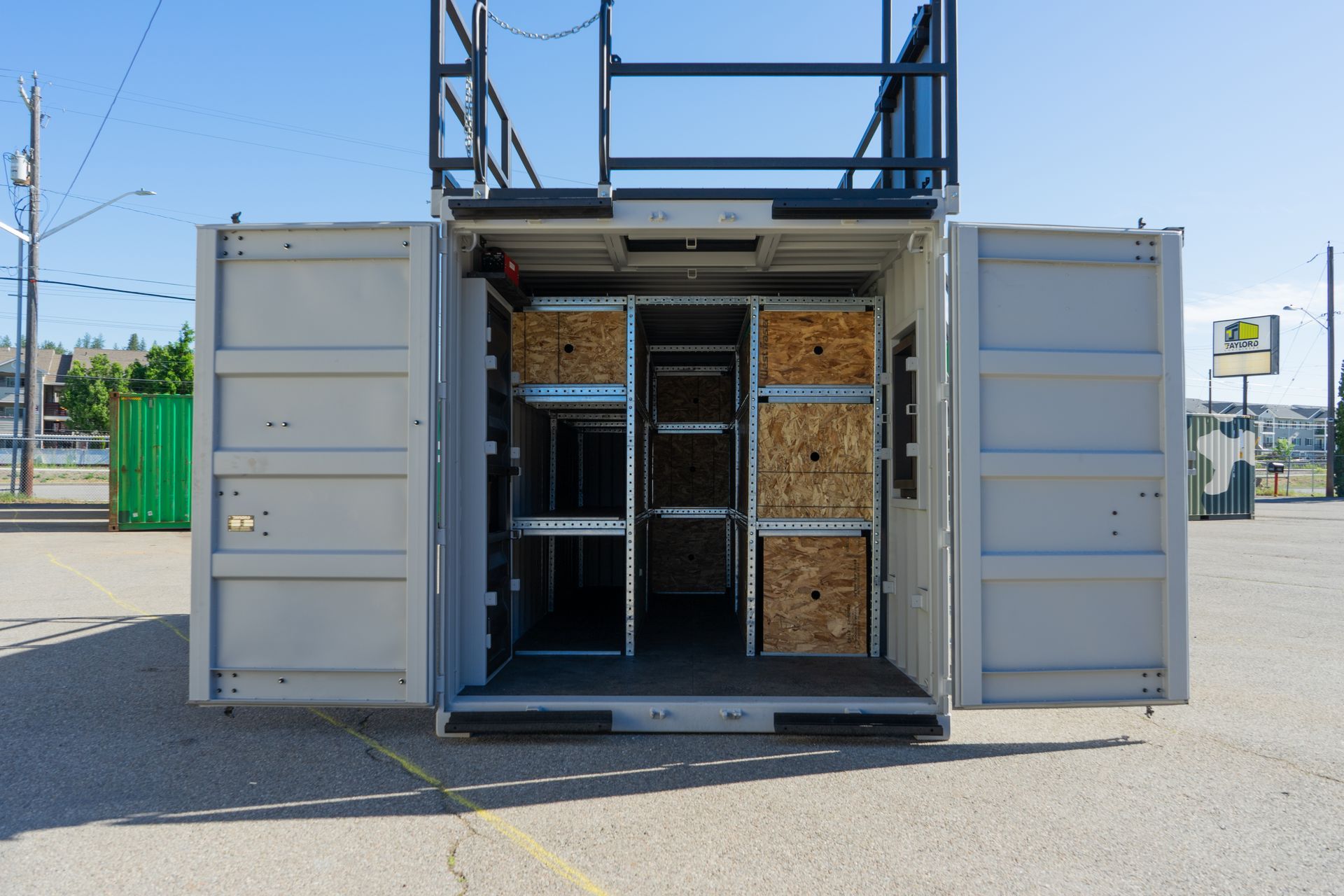 a shipping container with OSB inside of it