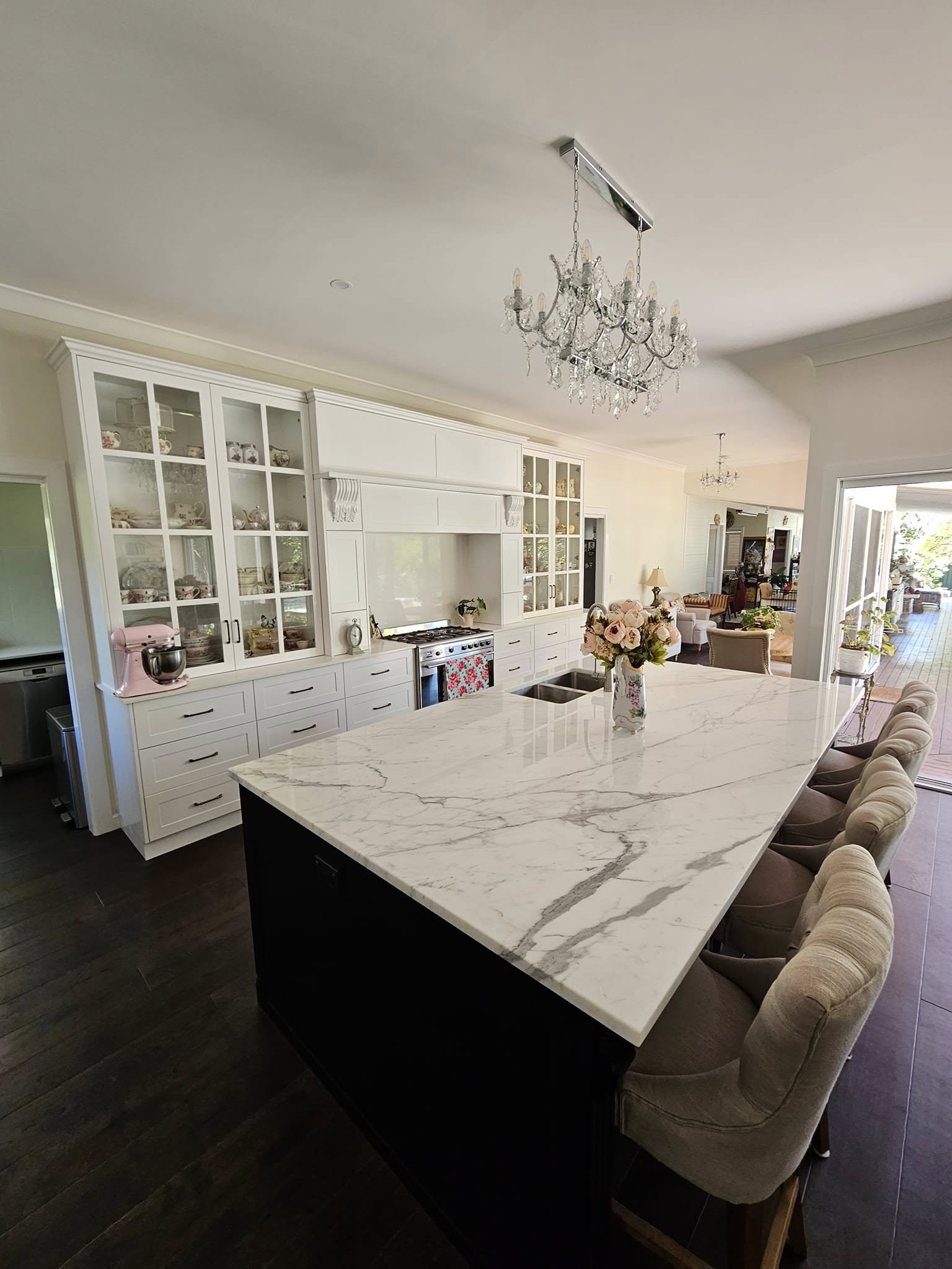 There is a large island in the middle of the kitchen.