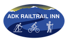 A logo for adk railtrail inn