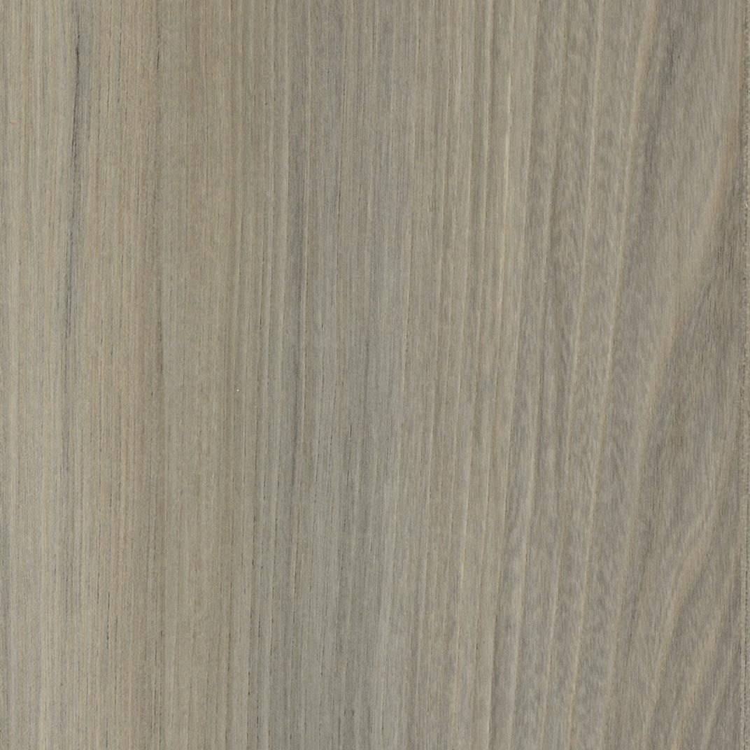 A close up of a piece of wood showing the texture of the wood.