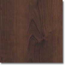 A close up of a piece of wood with a white background.