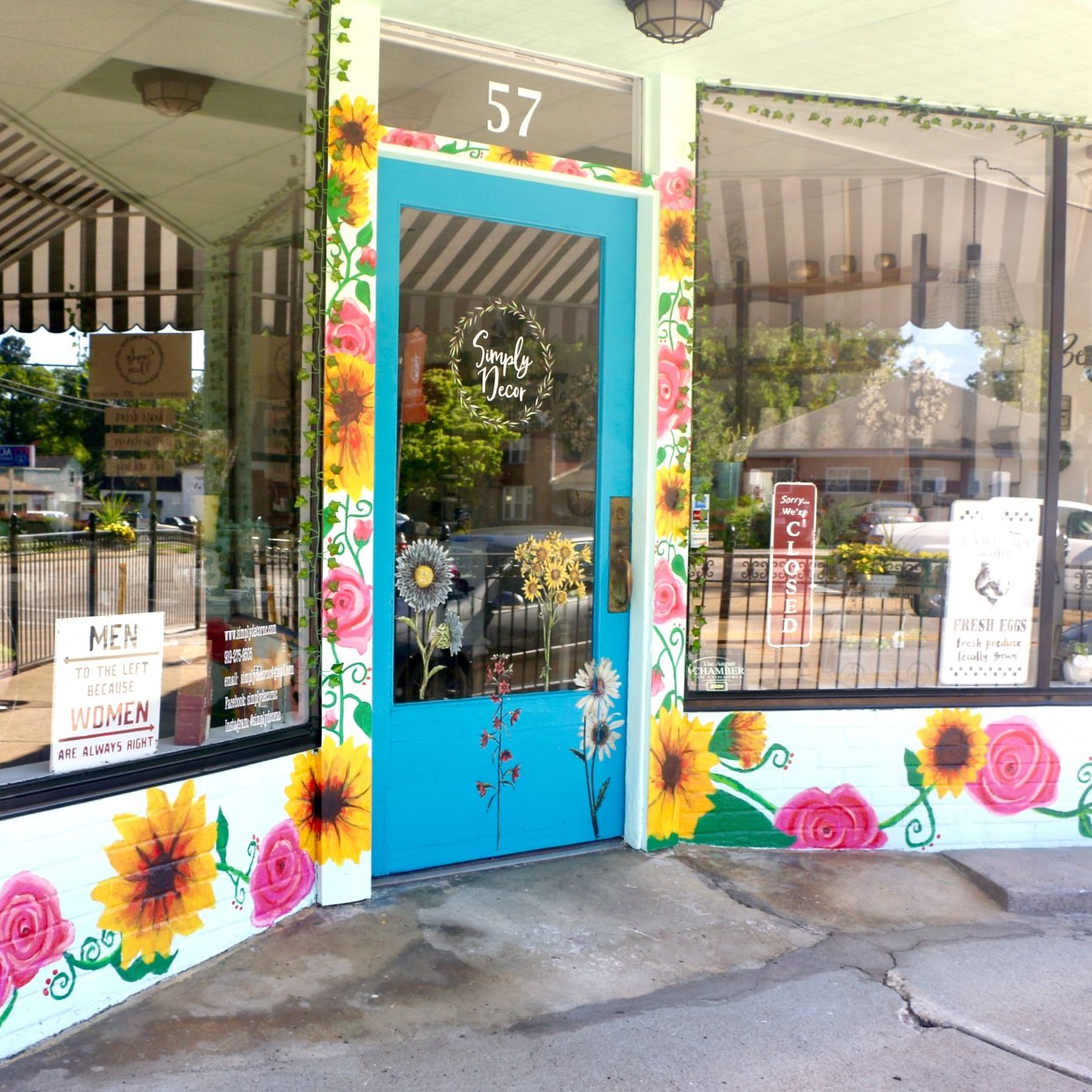 Flower mural around storefront of Simply Decor in downtown Angier, North Carolina by Elyse Johnson