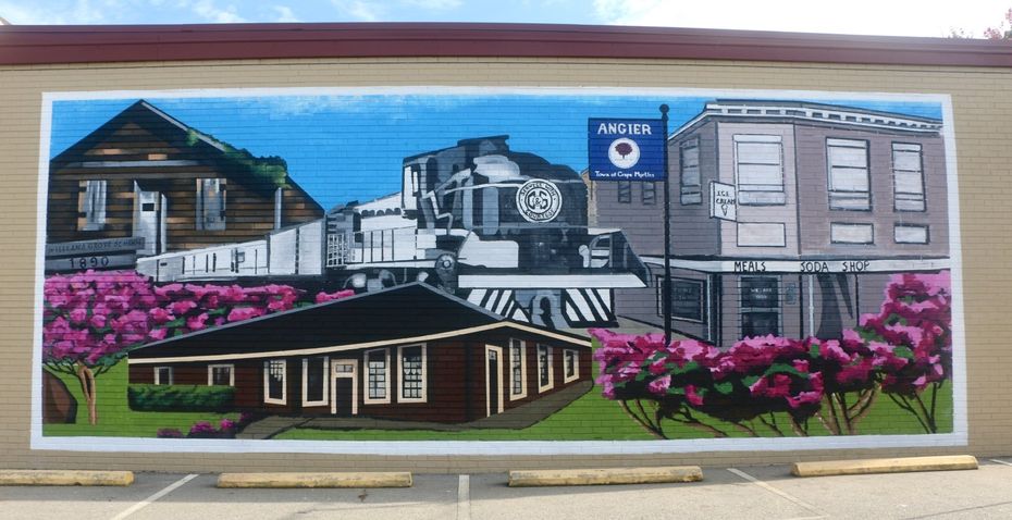 Pictures of a mural in Angier, North Carolina featuring a train depot, an old storefront, and crepe myrtles