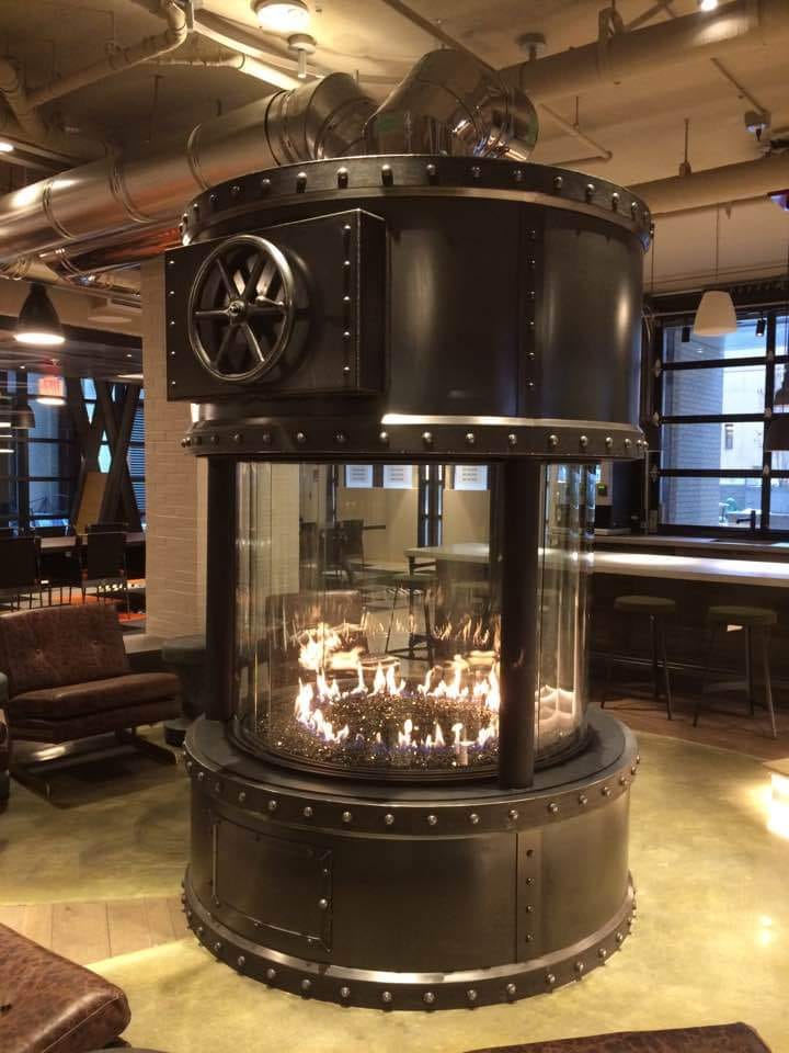 Business Metal Machine With Fire — Billings, MO — Hooten Construction & Welding