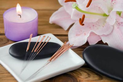 Acupuncture Needles And Candle — Morehead City, NC — Stephanie Kaplan Acupuncture